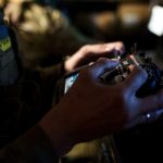 FILE PHOTO: Ukrainian serviceman controls a heavy combat drone while it flies over positions of Russian troops in Donetsk region